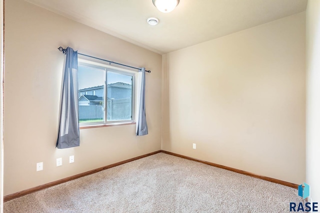 spare room with carpet flooring