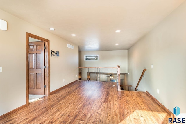 unfurnished room featuring hardwood / wood-style floors