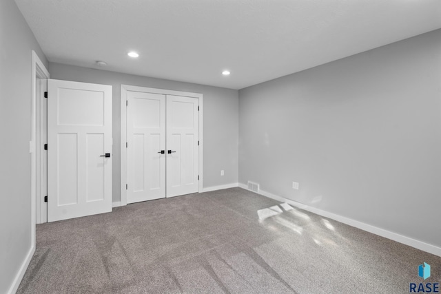 unfurnished bedroom featuring carpet floors