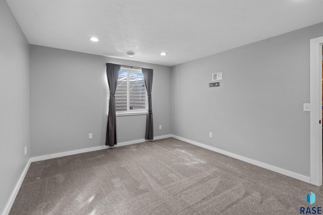 view of carpeted spare room