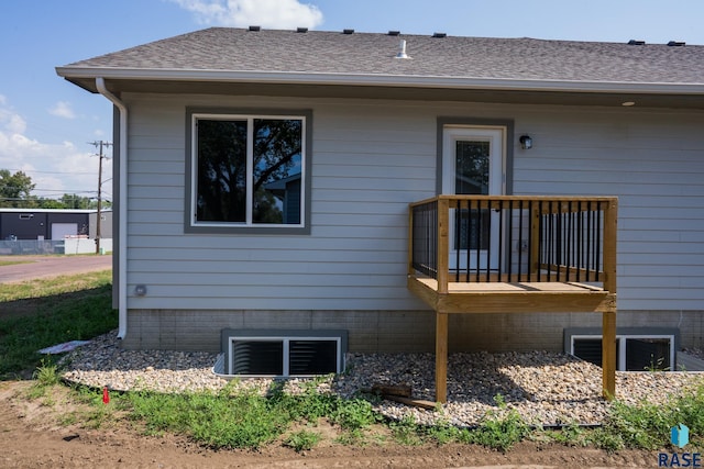 rear view of house featuring a balcony