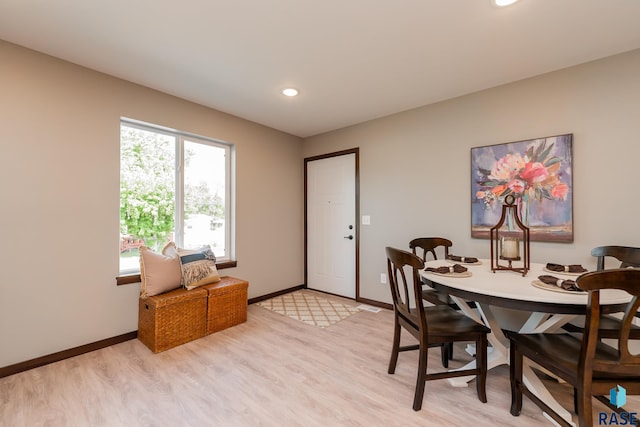 dining area with light wood-type flooring