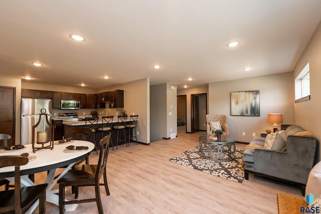 living room with light wood-type flooring