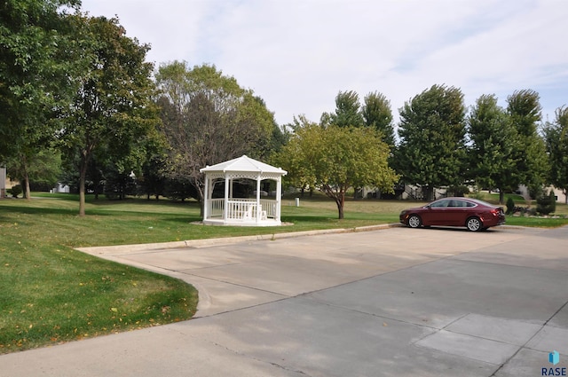 view of home's community featuring a gazebo and a yard