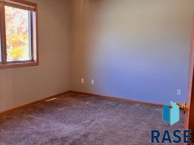 view of carpeted spare room