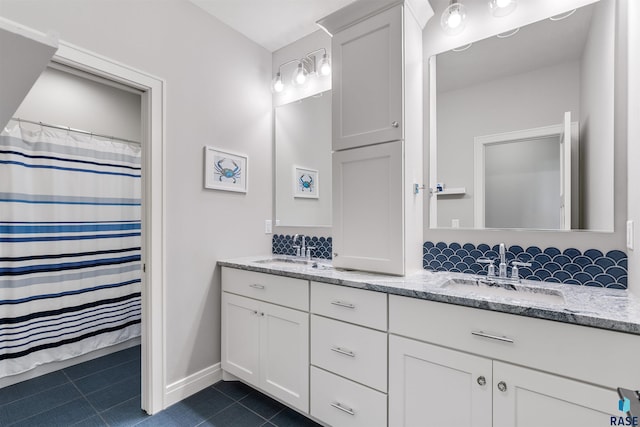 bathroom featuring vanity and tile patterned flooring