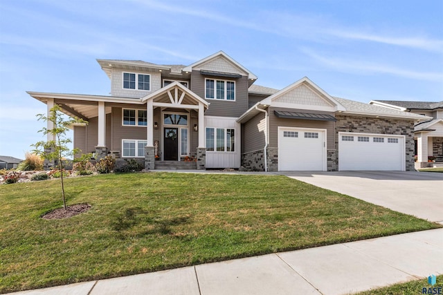 craftsman-style house featuring a garage and a front lawn