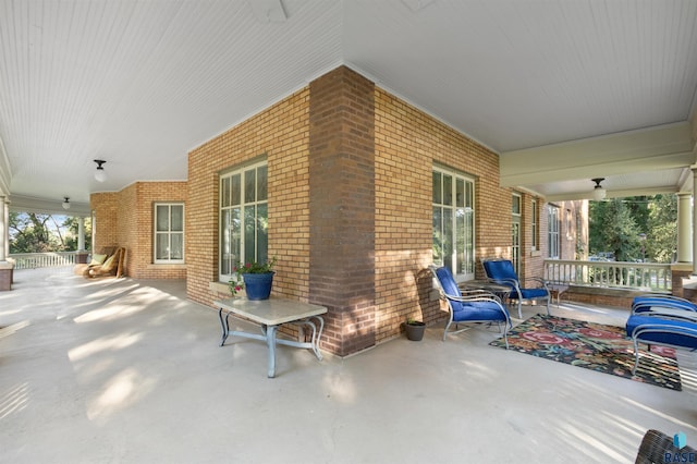 view of patio with ceiling fan