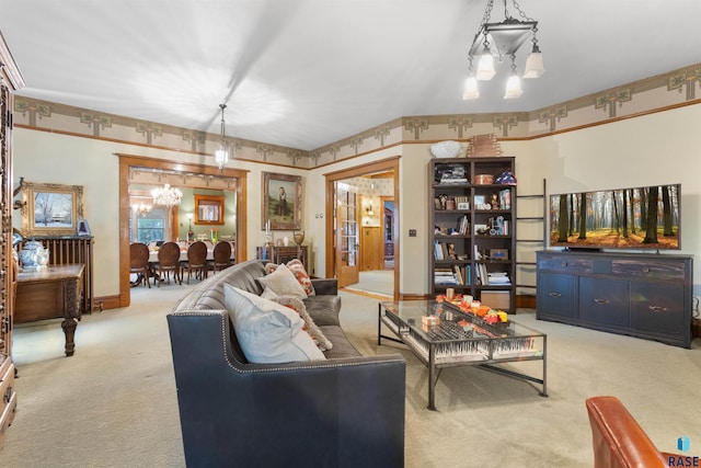 living room featuring a notable chandelier and light colored carpet