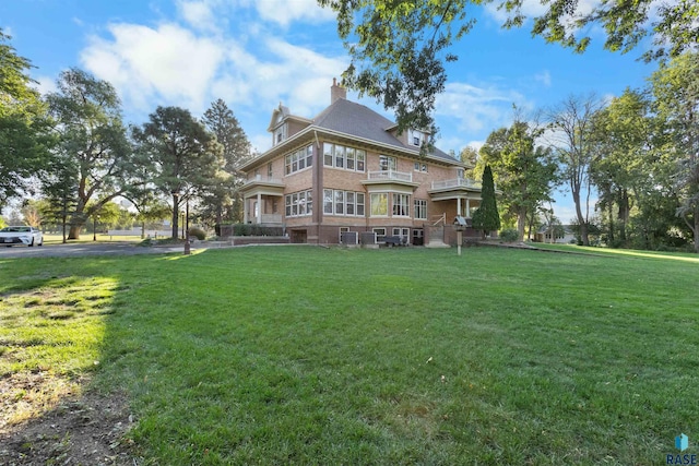 view of front of home with a front yard