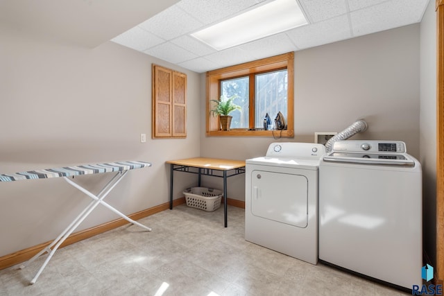 laundry room featuring separate washer and dryer