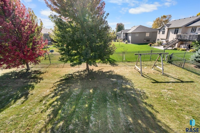 view of yard with a wooden deck