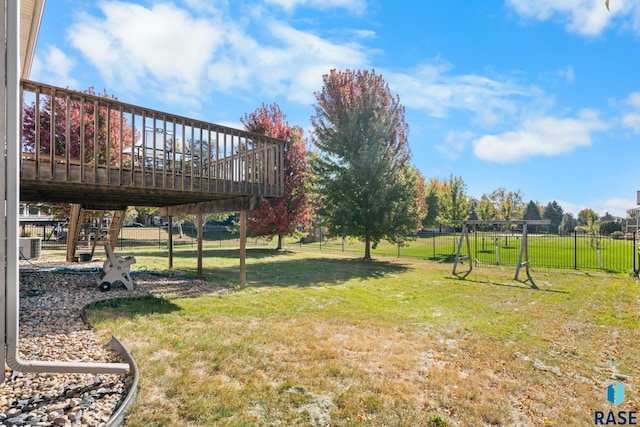 view of yard featuring a wooden deck