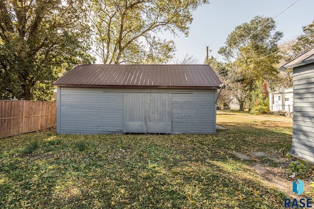 garage featuring a yard