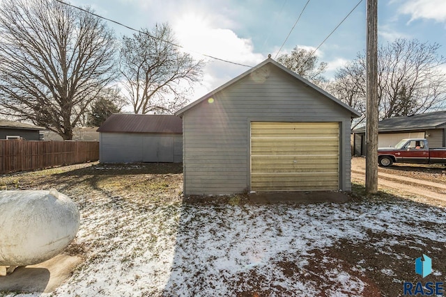 view of snow covered garage