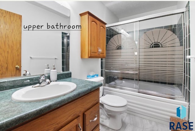 full bathroom with vanity, enclosed tub / shower combo, and toilet