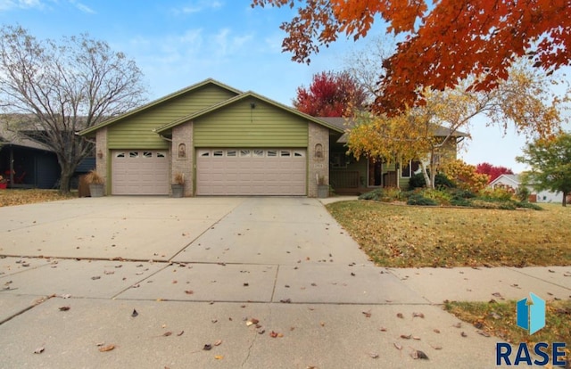 single story home featuring a garage