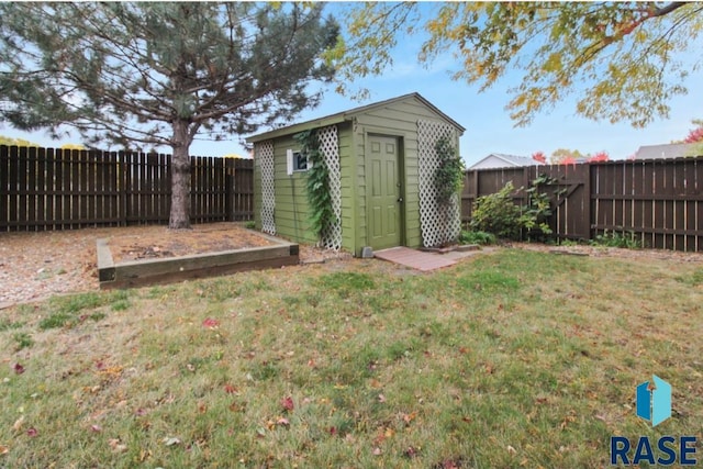 view of outdoor structure with a yard