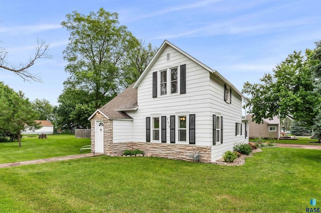 view of front of home with a front yard