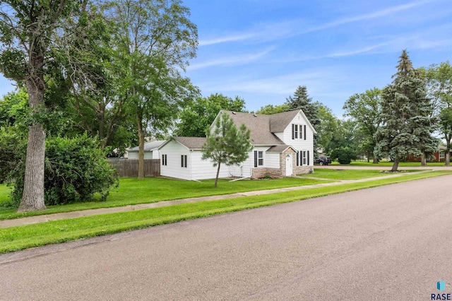 view of front of home with a front yard