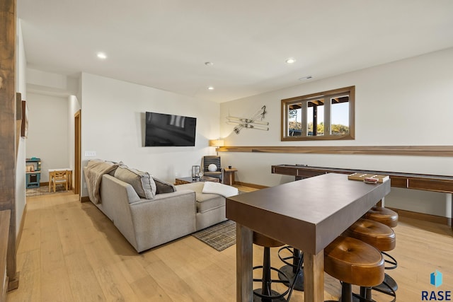 living room with light hardwood / wood-style floors