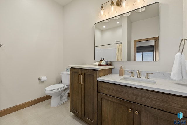 bathroom featuring toilet, a shower with curtain, and vanity