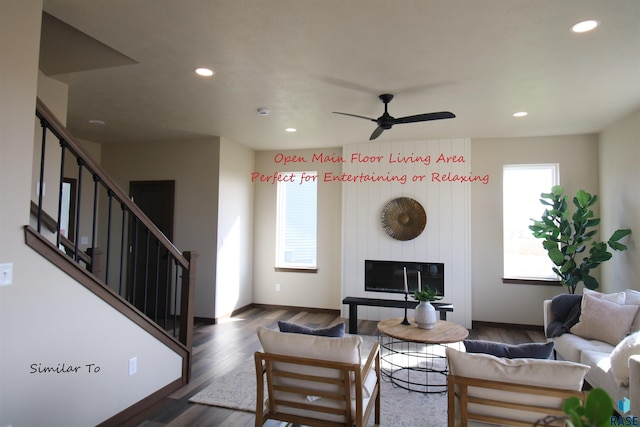 6509 S Barclay Trl, Sioux Falls, SD 57106 - living room featuring stairs, wood finished floors, recessed lighting, a fireplace, and a ceiling fan