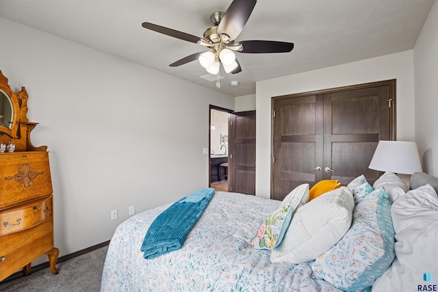 bedroom featuring a closet, light colored carpet, and ceiling fan