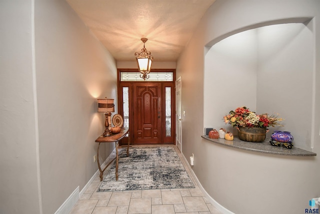 view of tiled entrance foyer