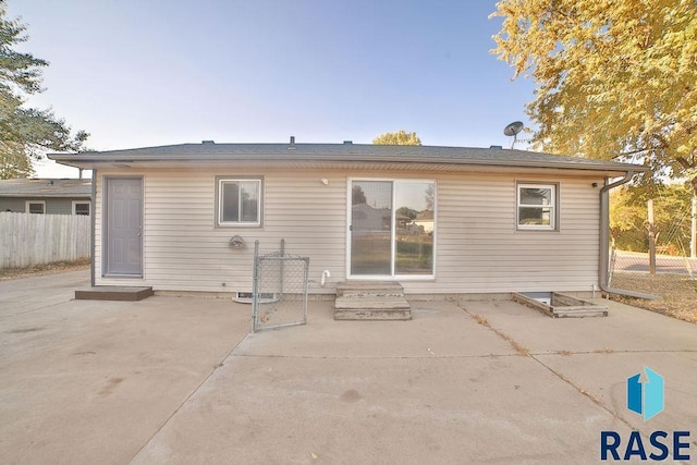 back of house with a patio