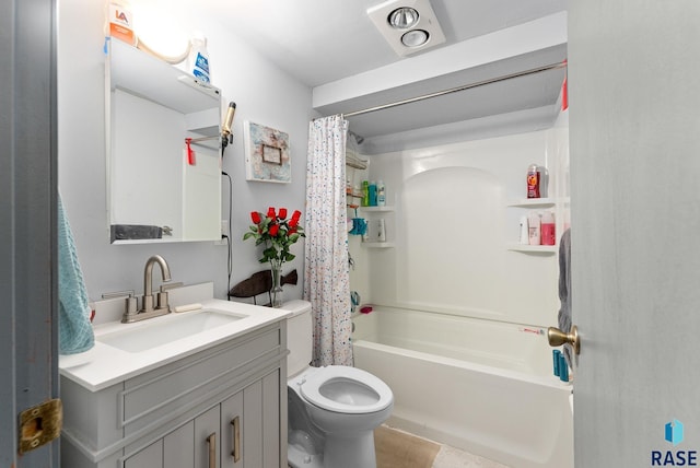 full bathroom with vanity, shower / bath combination with curtain, toilet, and tile patterned floors