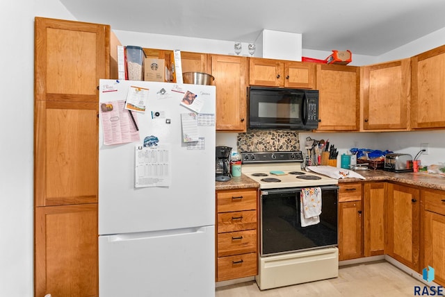 kitchen featuring white appliances