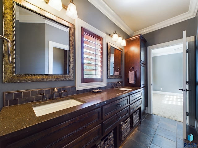 bathroom featuring vanity, ornamental molding, and tile patterned flooring