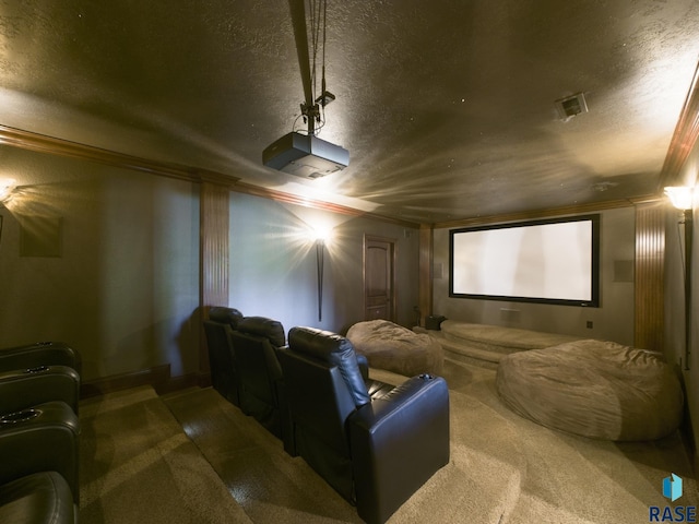 cinema room with crown molding, a textured ceiling, and carpet floors