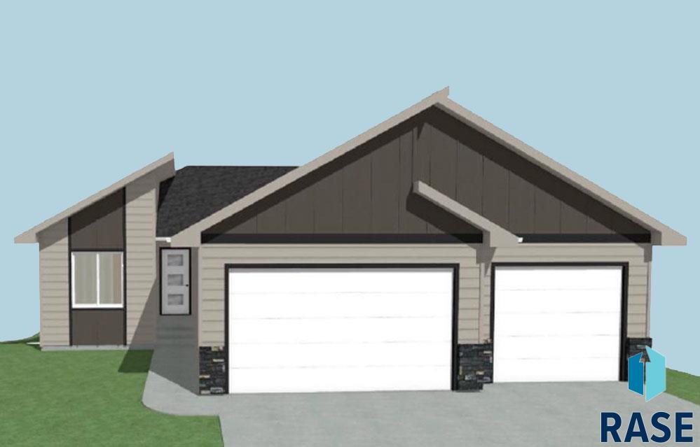201 N Everest Ave, Tea, SD 57064 - exterior space featuring concrete driveway, a garage, stone siding, and board and batten siding