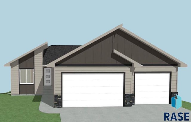 201 N Everest Ave, Tea, SD 57064 - exterior space featuring concrete driveway, a garage, stone siding, and board and batten siding
