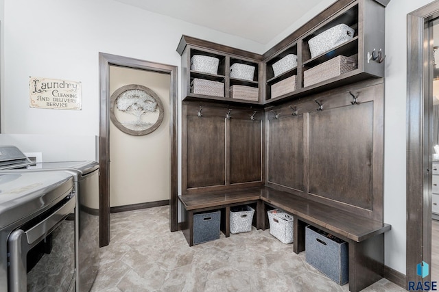 mudroom with washer and dryer