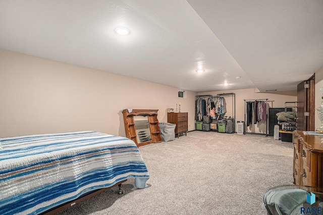 bedroom with light colored carpet