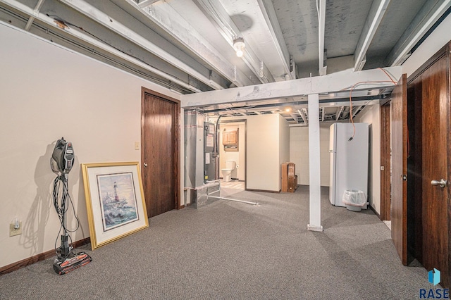 basement featuring carpet and refrigerator