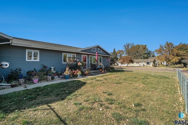 exterior space featuring a front lawn