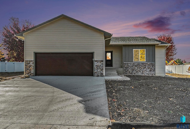 view of front of property featuring a garage