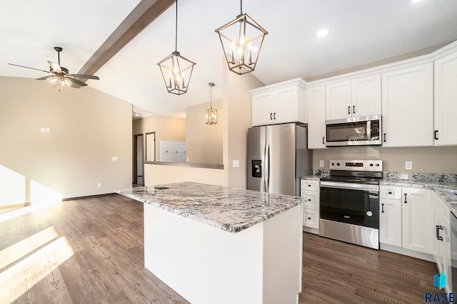 kitchen with vaulted ceiling with beams, dark hardwood / wood-style floors, decorative light fixtures, white cabinetry, and stainless steel appliances