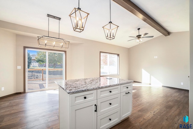 kitchen with white cabinetry, ceiling fan, plenty of natural light, and pendant lighting