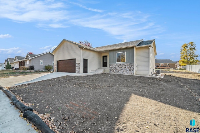 ranch-style home featuring a garage