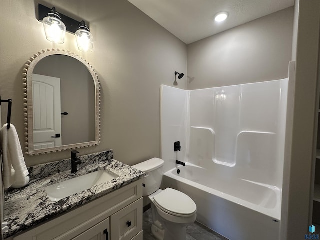 full bathroom with shower / tub combination, vanity, and toilet