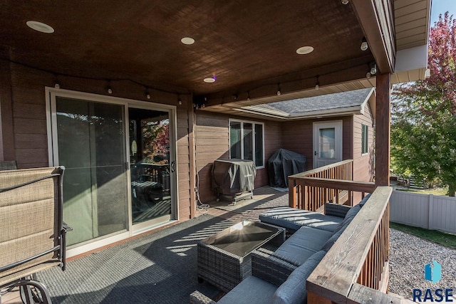 wooden terrace with grilling area