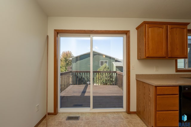 entryway featuring light tile patterned floors