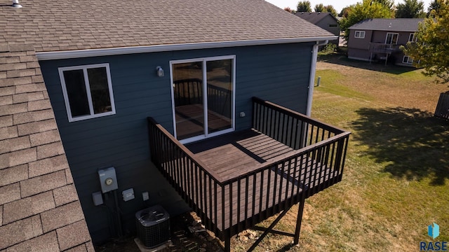 deck with central air condition unit and a yard