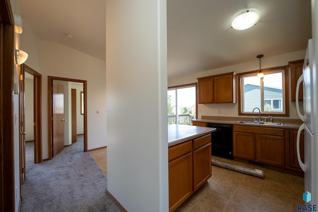 kitchen with white fridge, black dishwasher, hanging light fixtures, sink, and vaulted ceiling