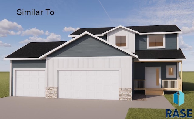 view of front of property featuring a garage and covered porch